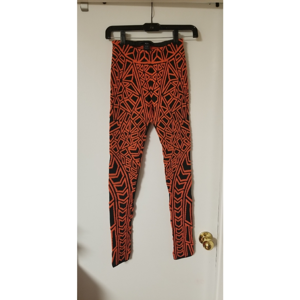 RVN size XS orange and black geo jacquard leggings